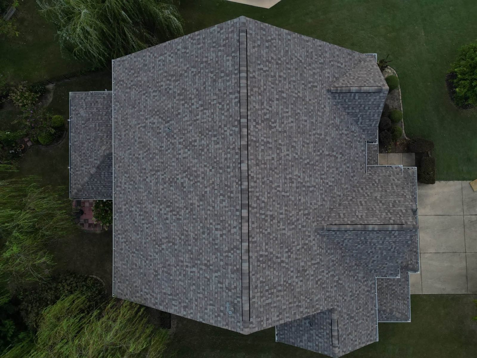 Top-down drone view of a shingle roof